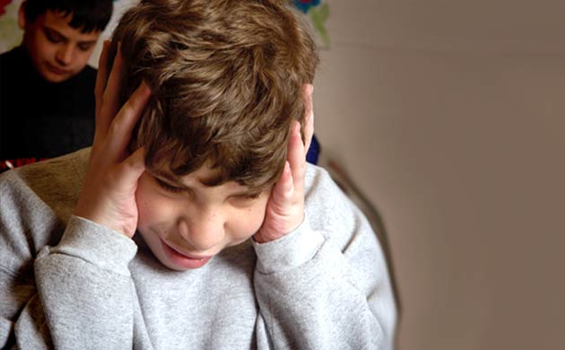 Criança com Síndrome de Asperger